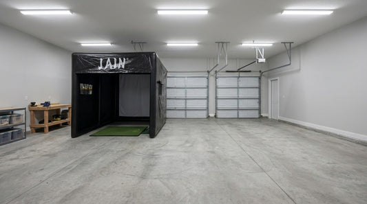 A black FunJain portable inflatable golf simulator set up inside a clean two-car garage