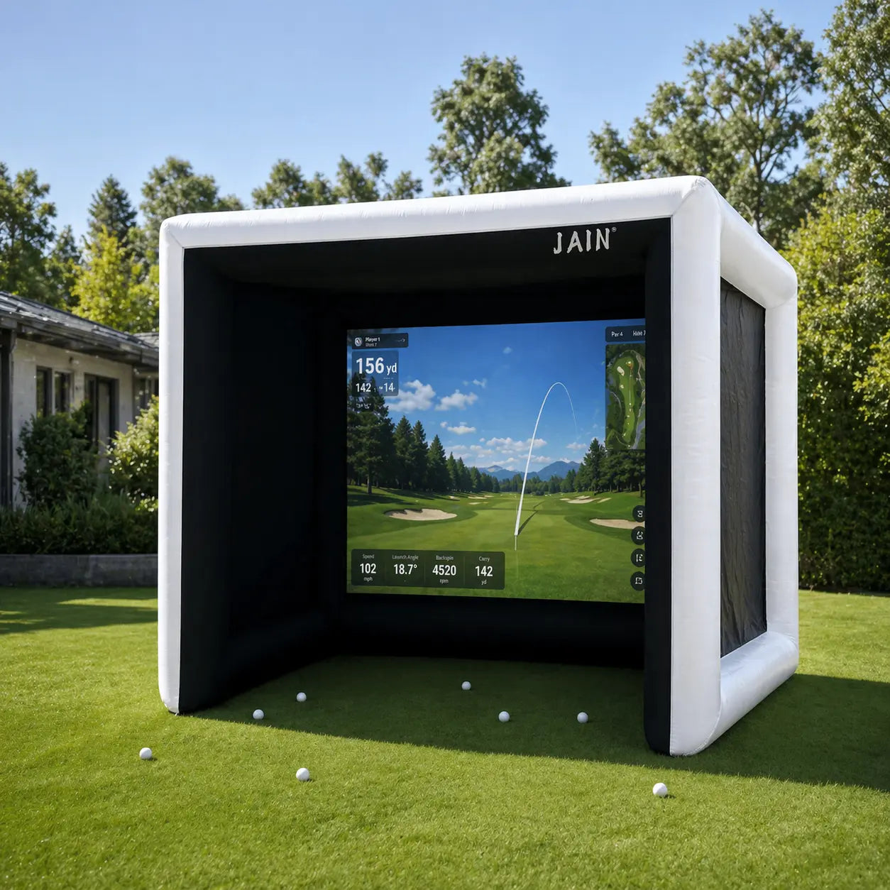 funjain inflatable golf simulator tent set up on a backyard lawn with realistic golf simulator screen and scattered golf balls